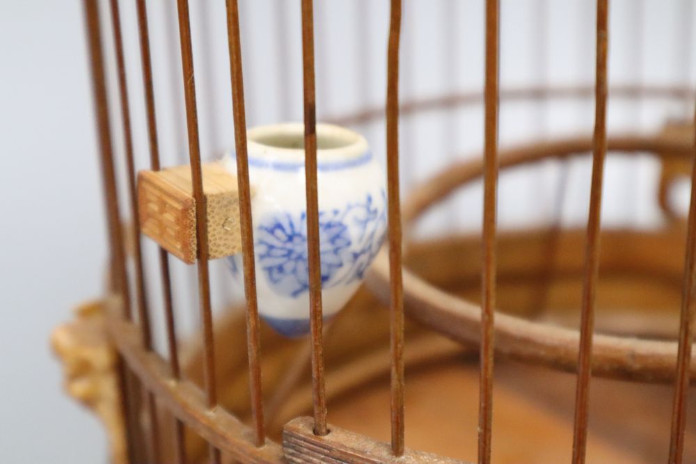 A Chinese bamboo bird cage, height 49cm